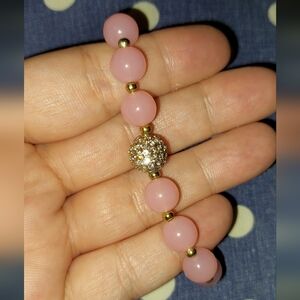 Elegant Pink Beaded Bracelet with Gold And Silver Accents